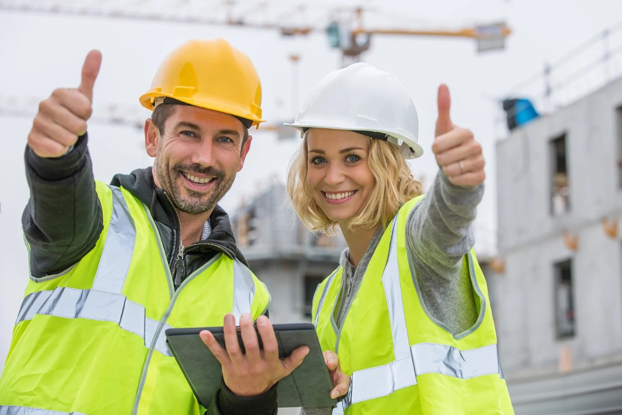 worker handling insulation wool